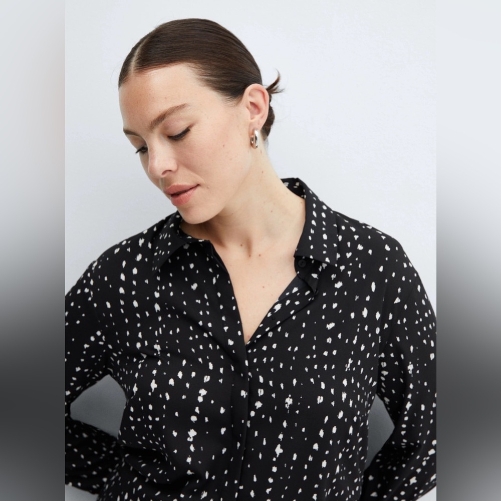 56. Mango Regular Flowy Shirt in black with an ecru printed pattern